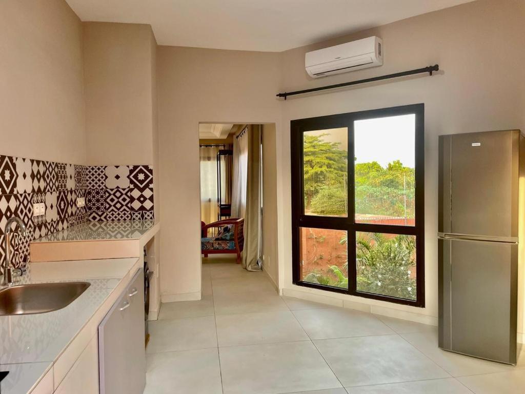 Le Kentia Hotel Lome Bagian luar foto